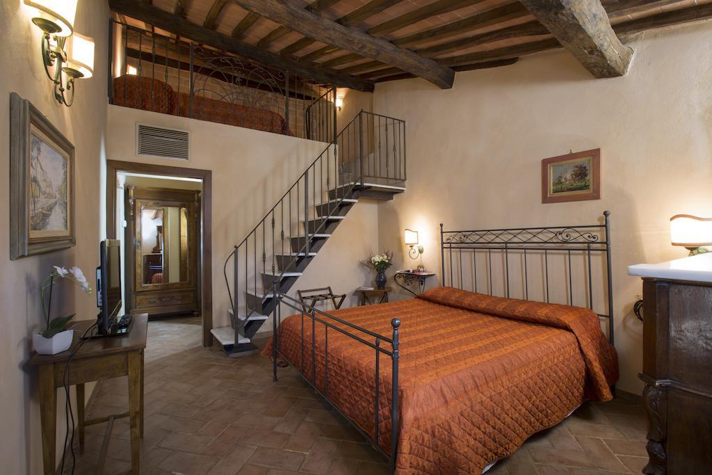 Camere Dentro Il Castello Монтериджоні Номер фото