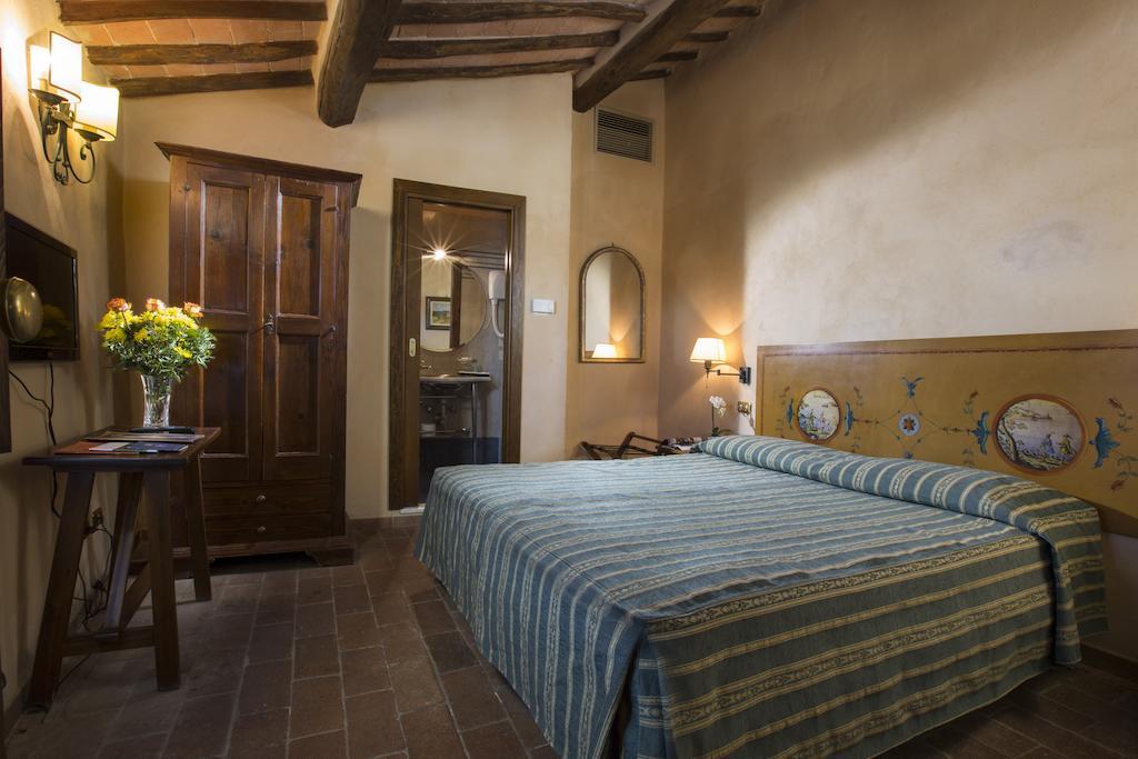 Camere Dentro Il Castello Монтериджоні Номер фото